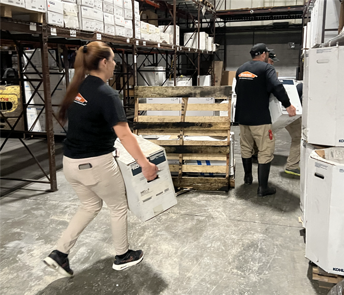 Commercial Cleanup in warehouse moving boxes